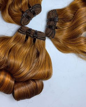 Weft hair – Egg curl – Brown color